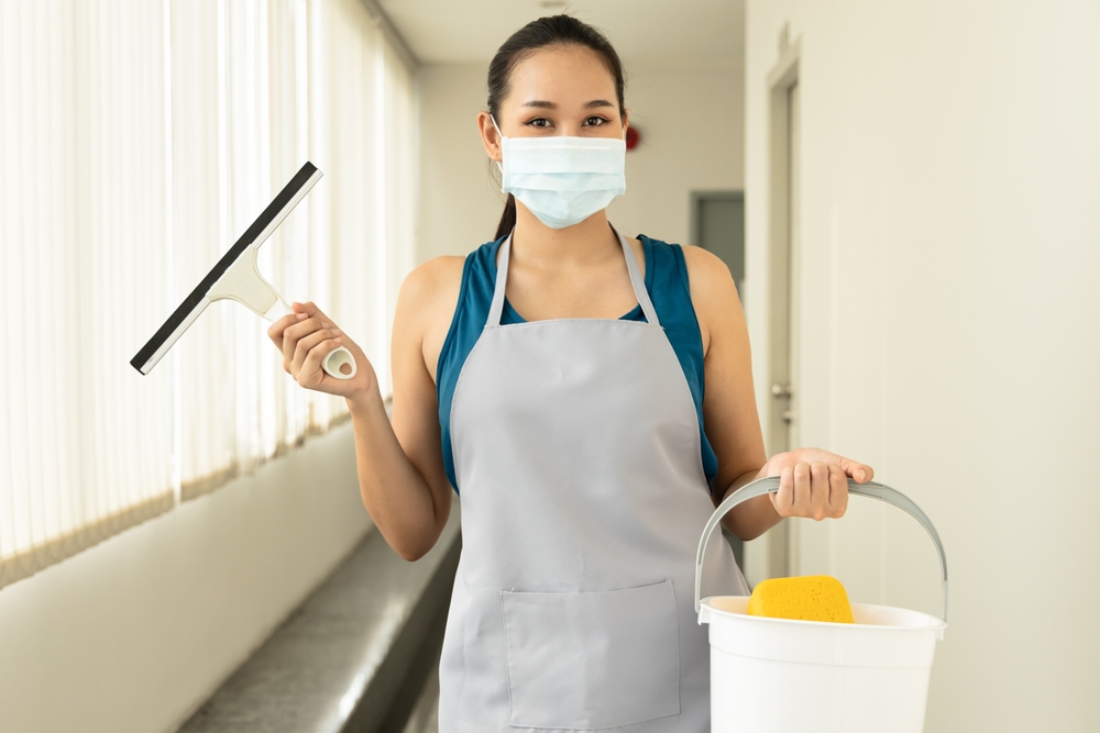 Happy,smiling,successful,asian,immigrant,cleaning,service,worker,woman,,concept